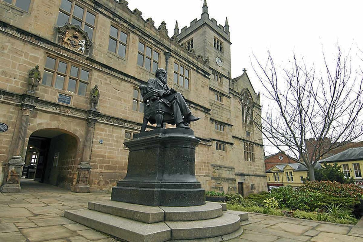 The statue of Charles Darwin outside Shrewsbury Library