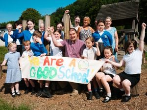Newcastle C of E Primary School in Newcastle-on-Clun are celebrating their Good Ofsted rating with their new lead teacher Chris Richards pictured at front.