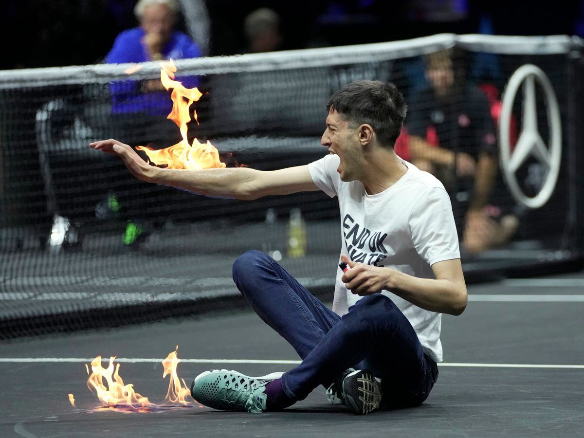 A man sets fire to his arm at the O2