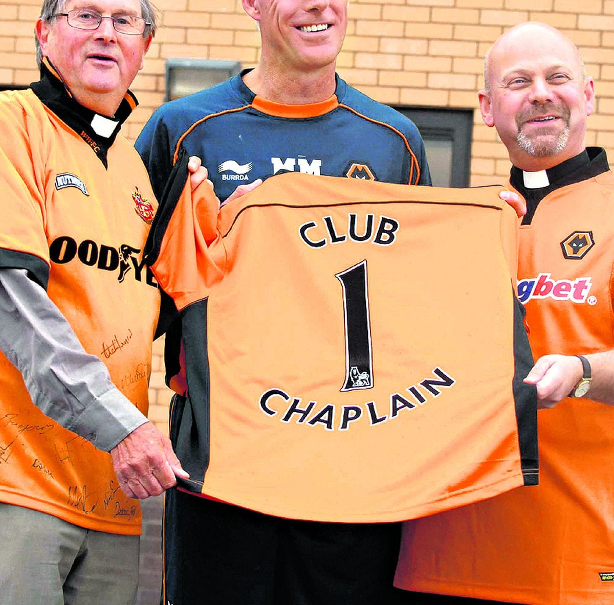 Taking over as Wolves chaplain, the Rev Preb David Wright was welcomed by then Wolves manager Mick McCarthy, and (left) outgoing club chaplain John Hall-Matthews