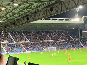 West Brom fans 'shine a light' in the 12th minute of their clash with Blackpool