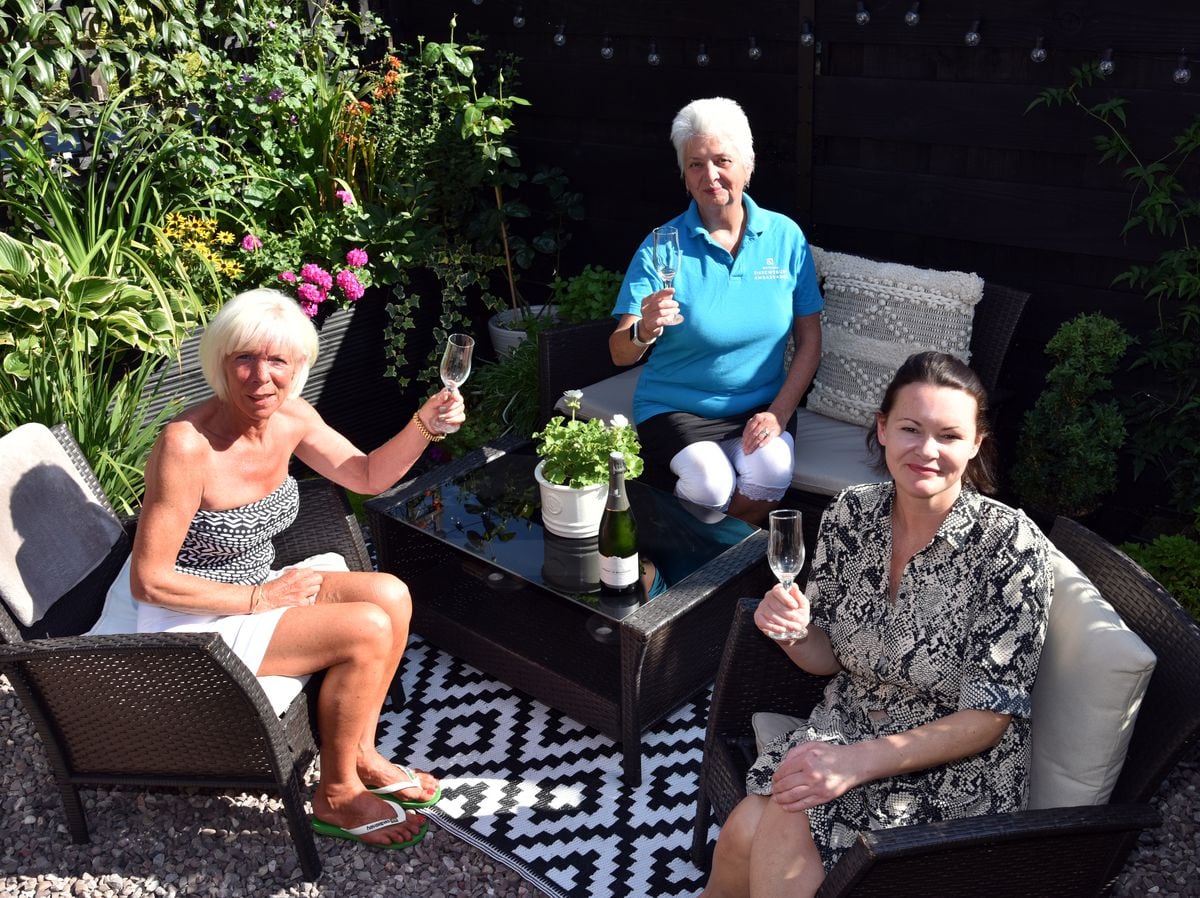 Vanessa Steadman celebrating her win with judge, Maggie Love and Balfours, Abigail Barker who organised the Annual English Garden competition.