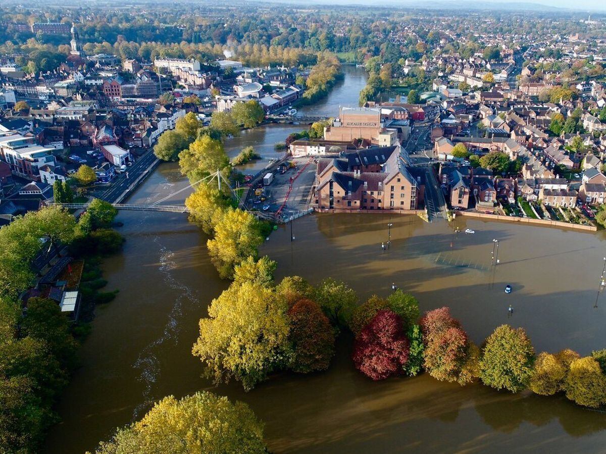 An aerial view of Shrewsbury during the height of the floods. Photo: @ChrisBaingerEA