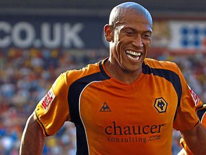 Chris Iwelumo and ex-team-mate Andy Keogh celebrate after one of his goals in his time at Molineux