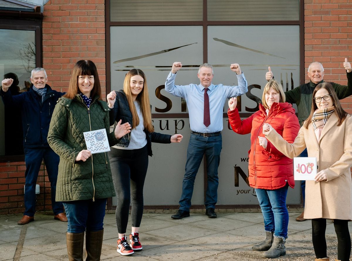 Stans Superstore in Oswestry is celebrating what would have been Stan Faulks' 100th Birthday. From left; Robert Faulks, Sarah Dodsworth (Front), Bethan Faulks, Andrew Faulks, Lisa Faulks, Peter Faulks and Katie Chaplin.