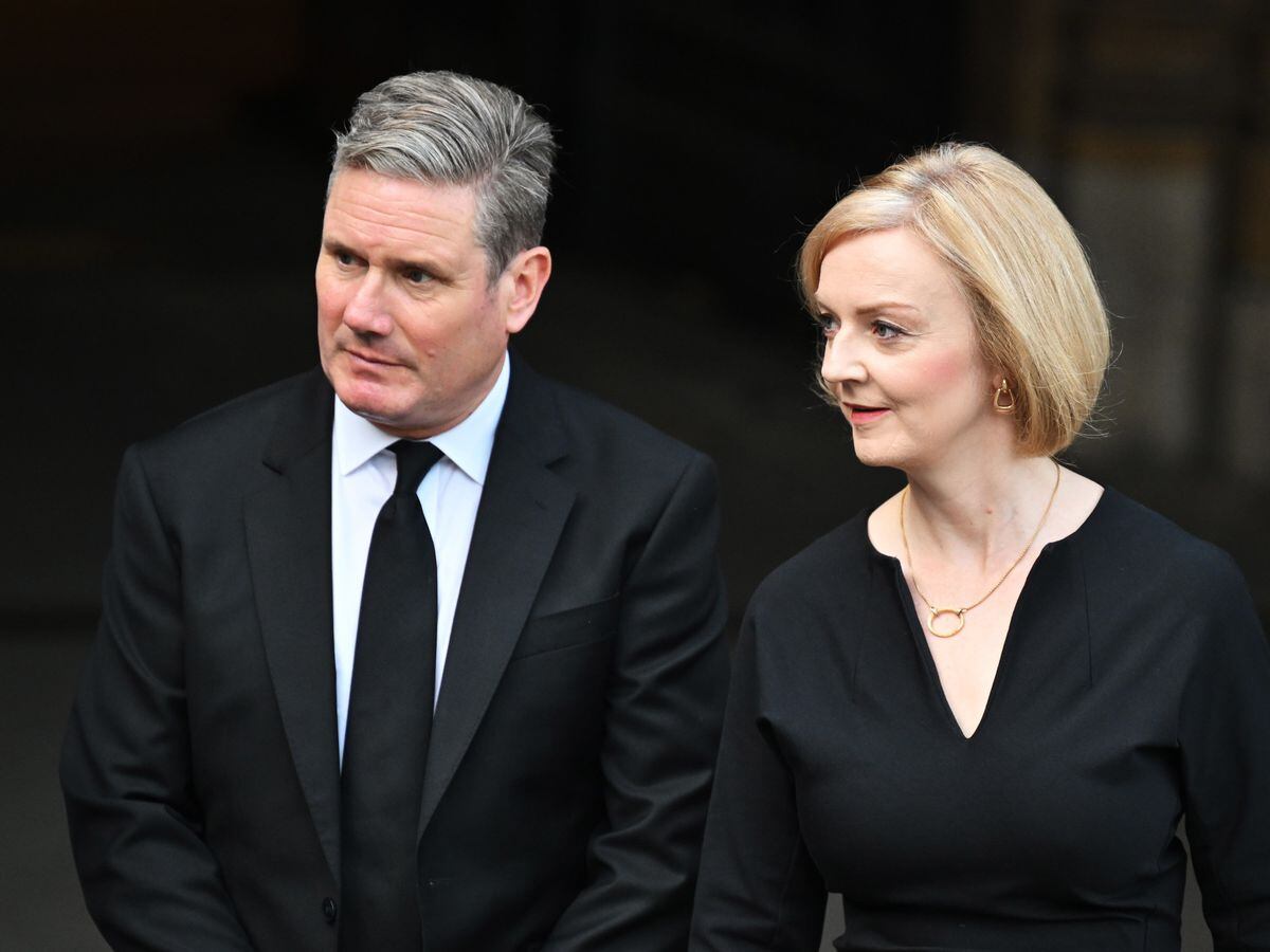 Labour leader Sir Keir Starmer and Prime Minister Liz Truss leave Westminster Hall, London
