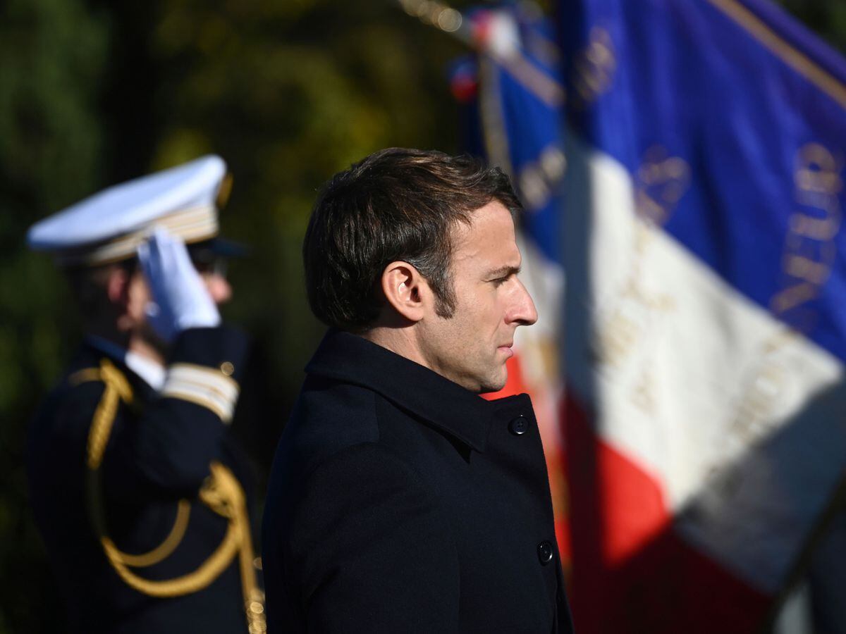 French President Emmanuel Macron pays his respects during a ceremony at the Camp des Milles memorial site in Aix-en-Provence, southern France