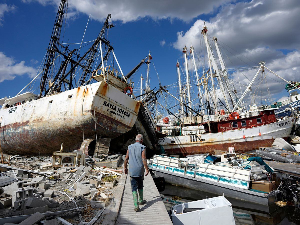 smashed boats following hurricane