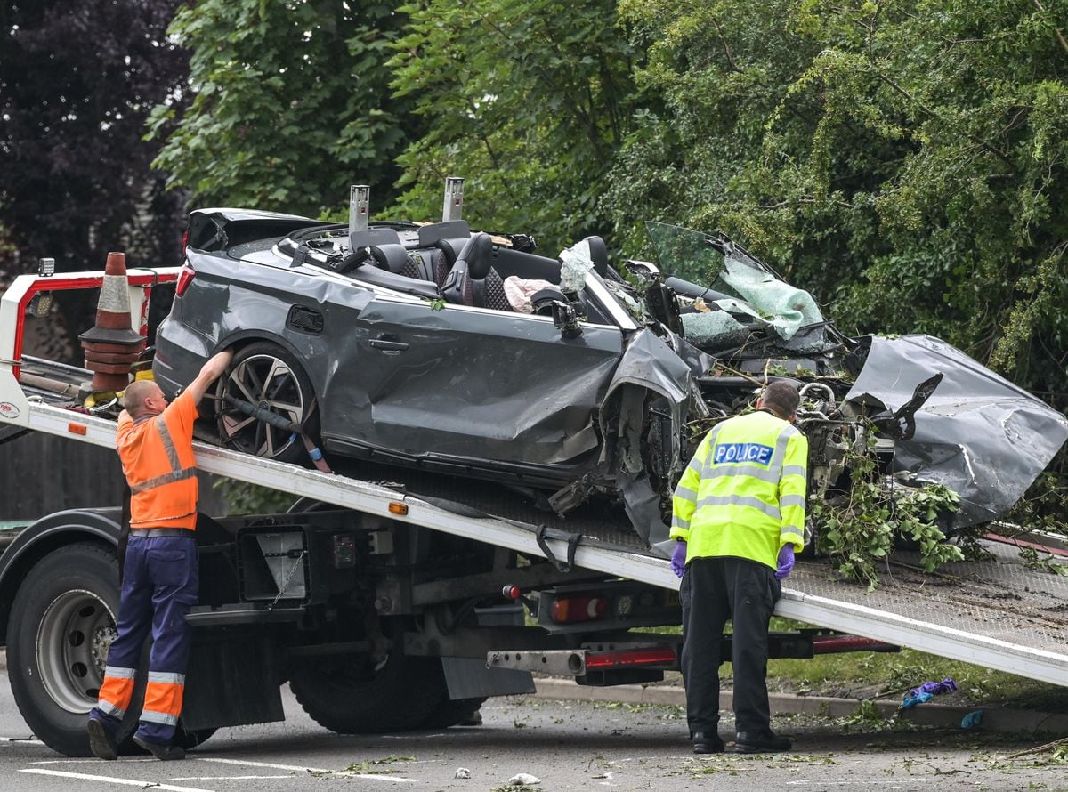 The convertible Audi is recovered from the scene of the crash. Photo: SnapperSK