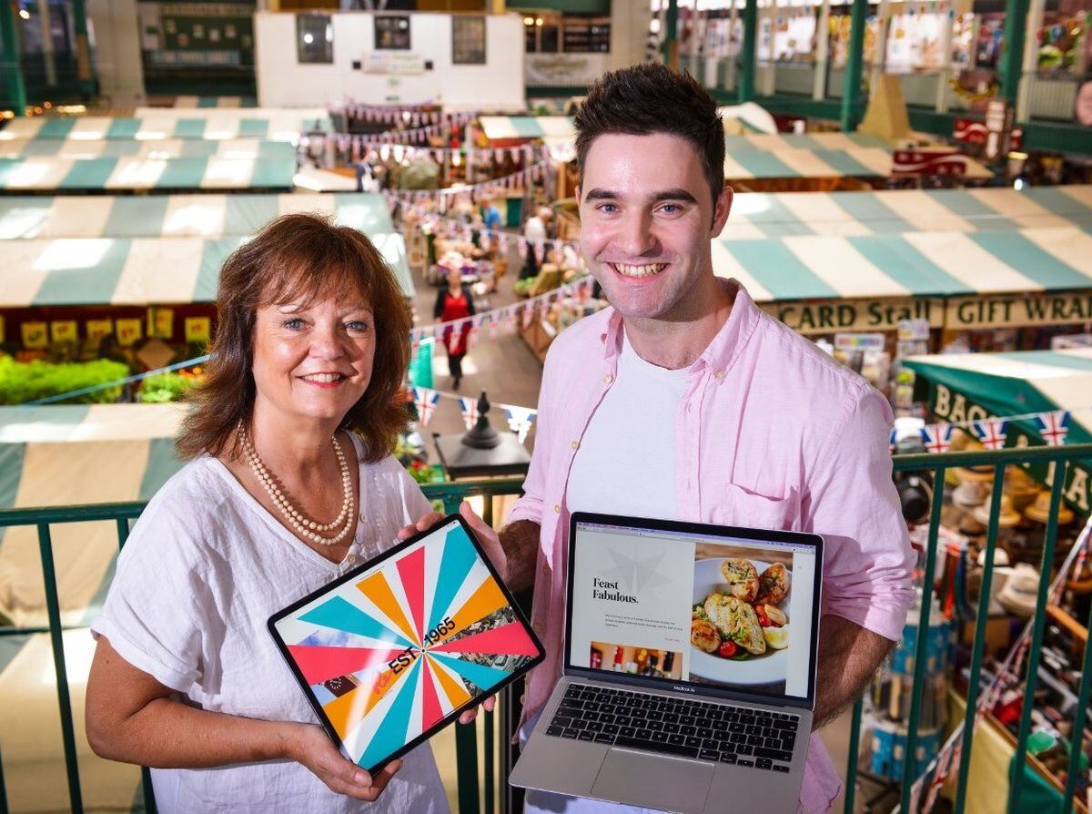 Shrewsbury Market Hall facilities manager Kate Gittins with website designer George English