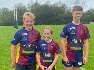 Clee Hill Mini Rugby Club players Harry Kirton, Sophie Hulland and Rhys Breakwell sporting their new shirts sponsored by Halls.