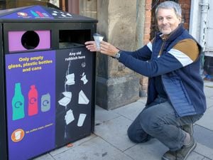 Councillor Tim Nelson with one of the recently installed bins