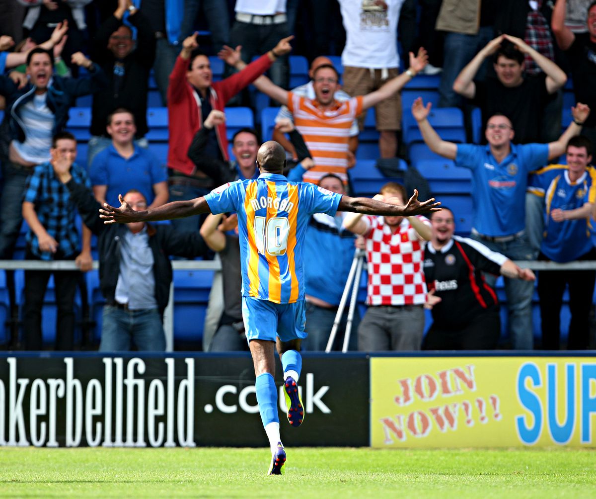 Marvin Morgan of Shrewsbury Town celebrates after scoring to make it 3-1