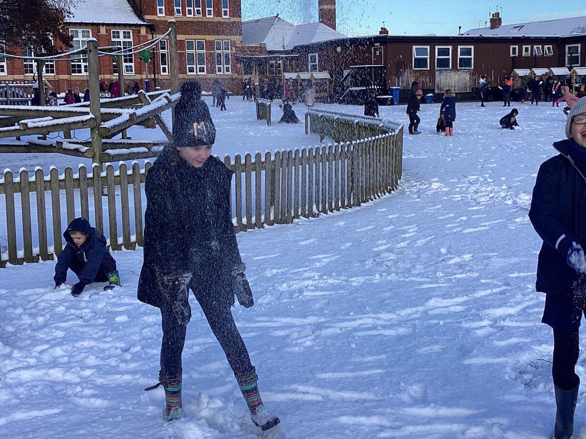 Children from Whitchurch Junior School wrapped up and enjoyed some fun in the snow. Photo: Whitchurch Junior School. 
