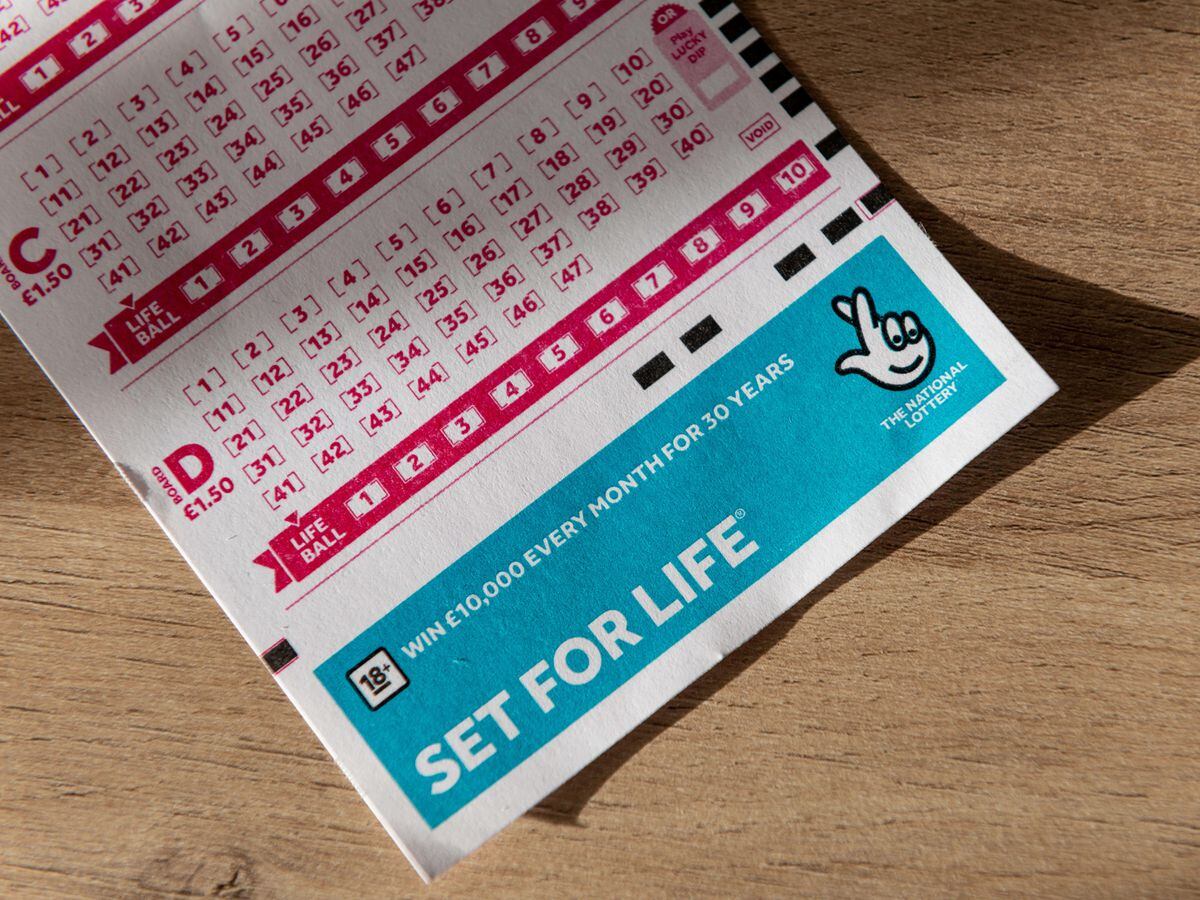 Close-up of a National Lottery Set For Life playing coupon