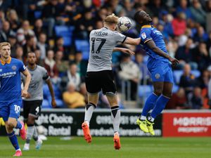 Dan Udoh of Shrewsbury Town and Connor Taylor of Bristol Rovers (AMA)