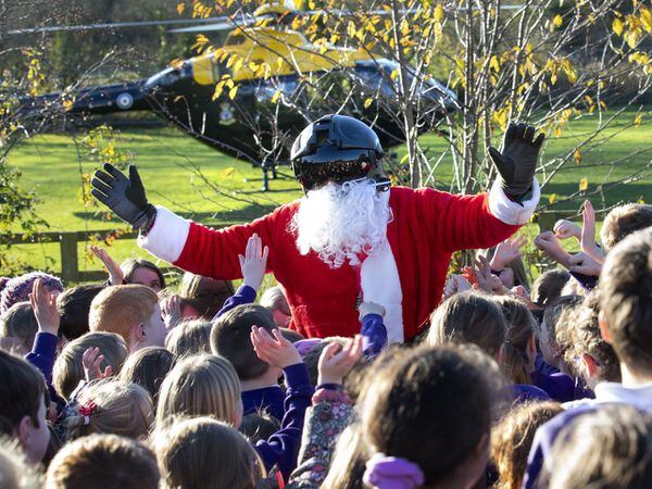 Father Christmas greets the children at St Mary’s Primary School, Shawbury