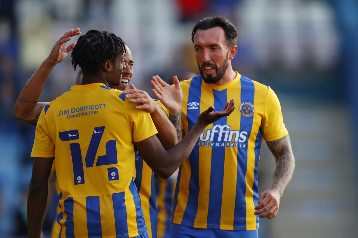Ryan Bowman of Shrewsbury Town celebrates with his team mates after scoring a goal to make it 1-2. (AMA)