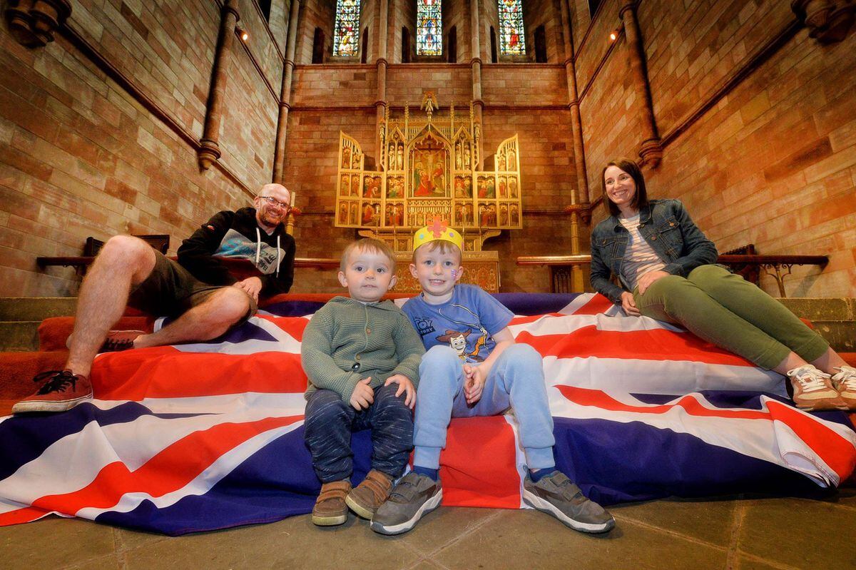 Making crowns were Aiden Goodchild, 4, and Theo Goodchild, 2, with parents Simon Goodchild and Natasha Newman