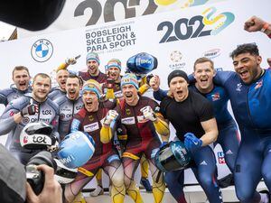 Pilot Brad Hall and his team became the first British quartet in 84 years to claim a world championships medal in four-man bobsleigh