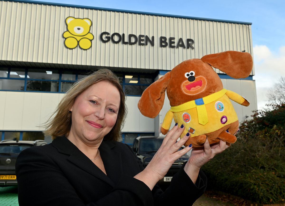 Kathy Lesser with a popular Hey Duggee toy outside Golden Bear Ltd, Telford 