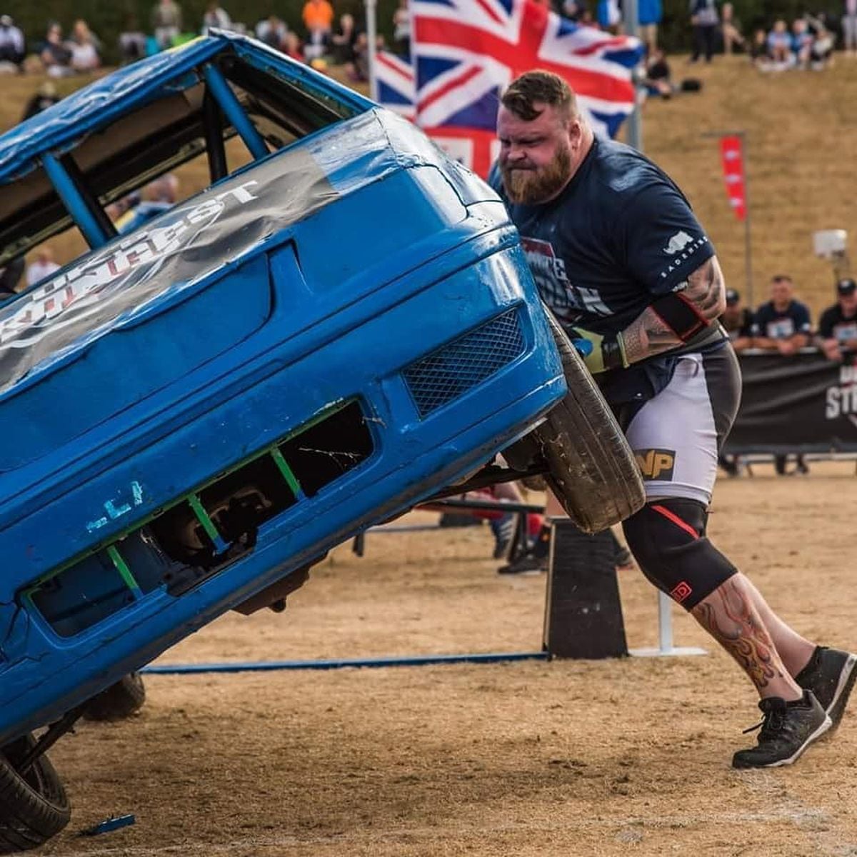 Carry that weight England's strongest man on pulling trucks, flipping