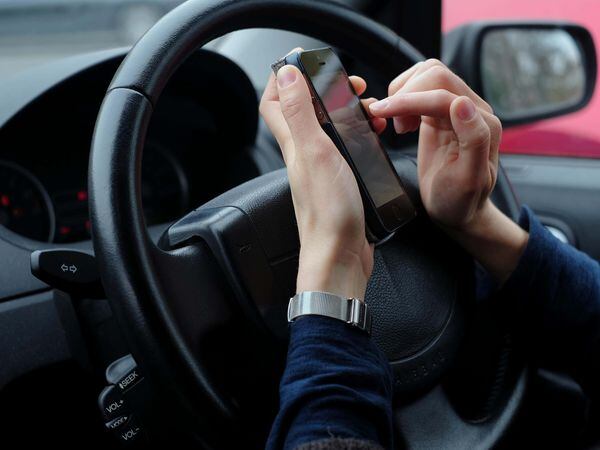 Using mobile phone whilst driving