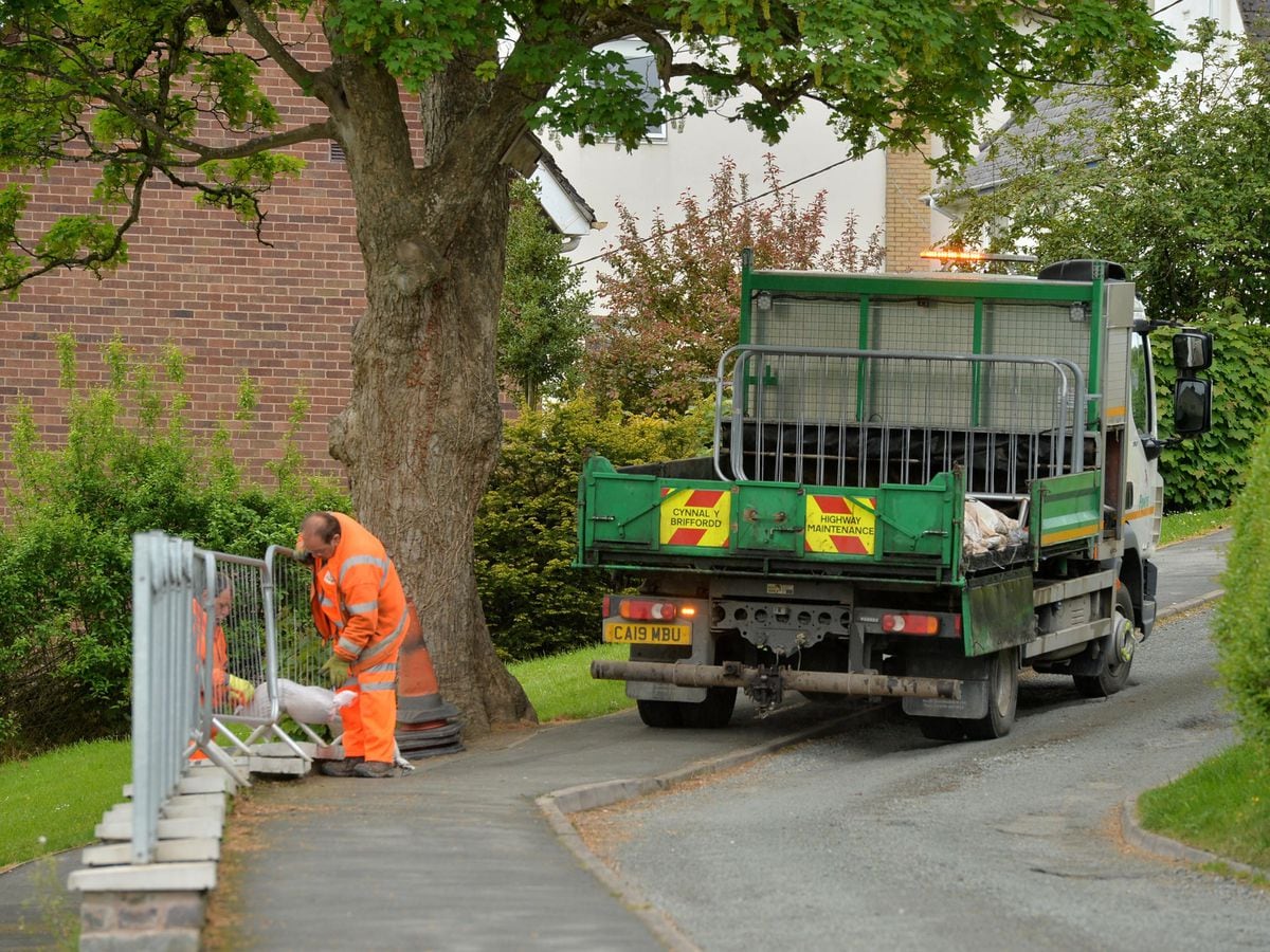 Council workers could be seen fixing the railings at the scene of the crash this morning