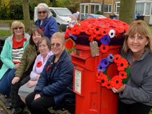 Albrighton Craft Group have been busy decorating, pictured here with a knitter bombed post box. At the front is: Jan Gold, and standing at the back of the bench is: Judy Green, then sitting L-R: Nicky Huish, Carolyn Roberts, Dorothy Marsh and Irene Taylor