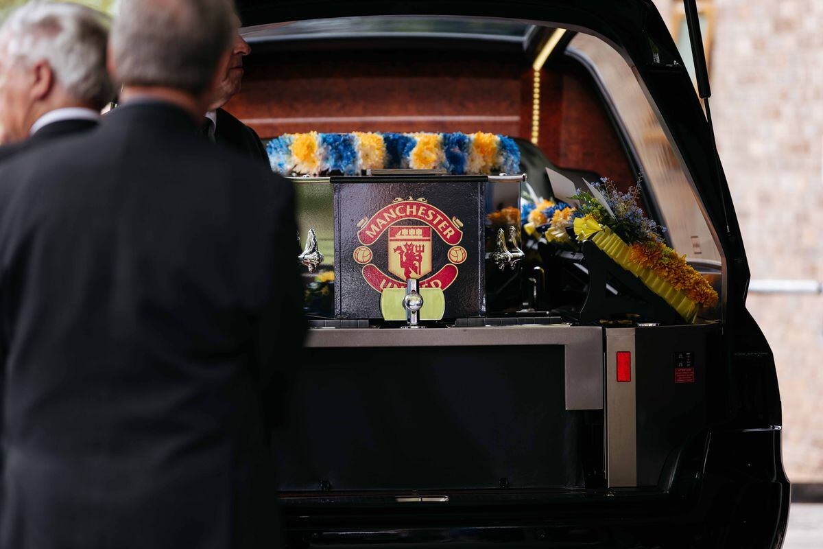Nathan Fleetwood's coffin was adorned with the Manchester United crest and blue and amber flowers for Shrewsbury Town FC