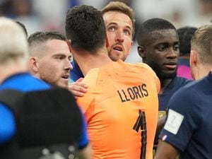 Harry Kane is consoled by Tottenham team-mate Hugo Lloris