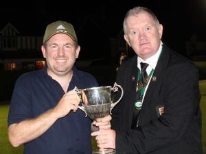 Winning smile - Andy Marshall receives the Harris Cup from Mid Shropshire president Mike Potter