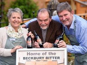 Kate Stevenson, and Simon Stevenson, right, from Beckbury Community Shop, Shifnal, with David Rawstorne, centre, who devised the recipe for the new Beckbury Bitter.