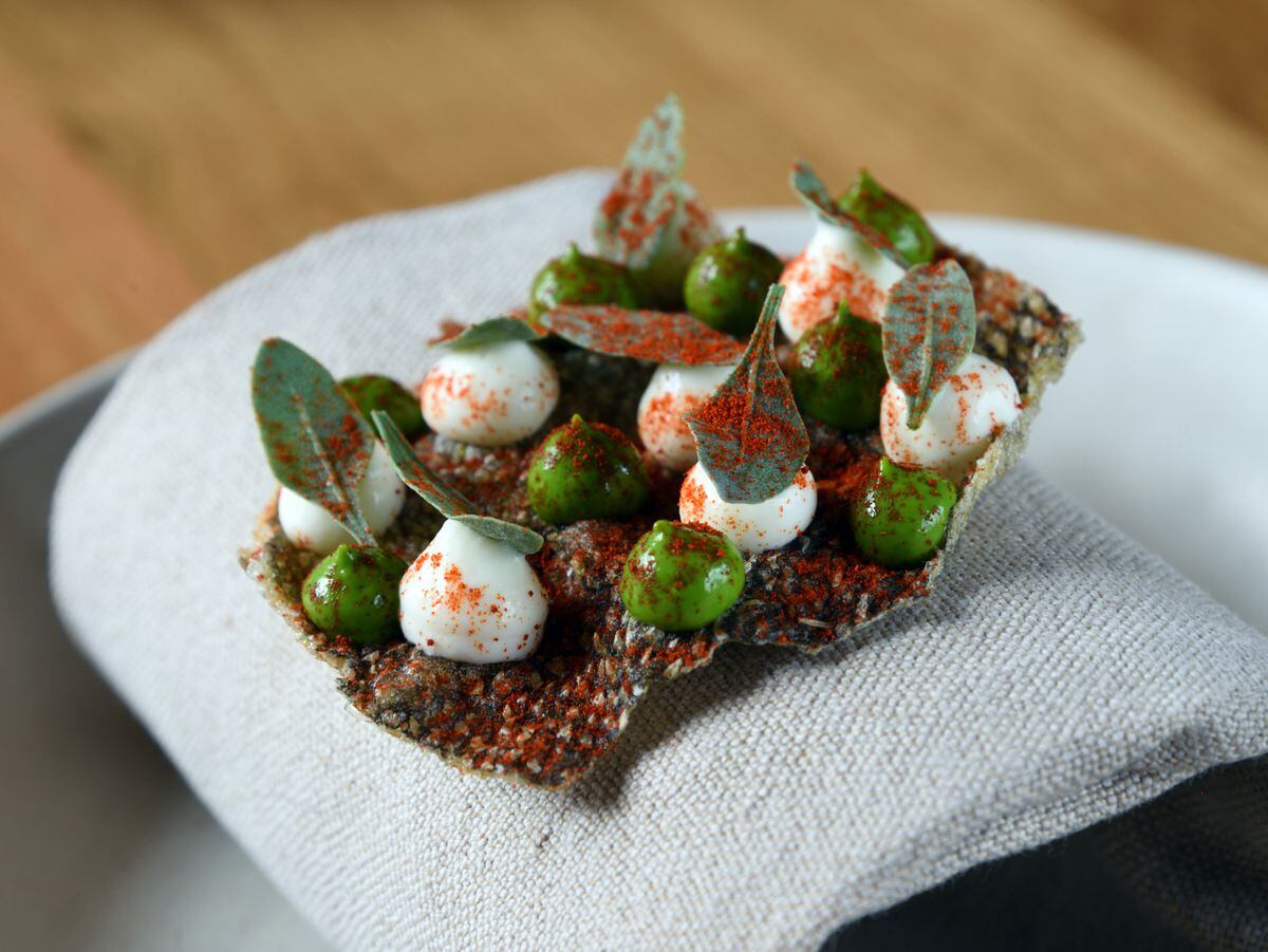 A fish skin canape is one of the eye-catching and delicious dishes available at Pensons