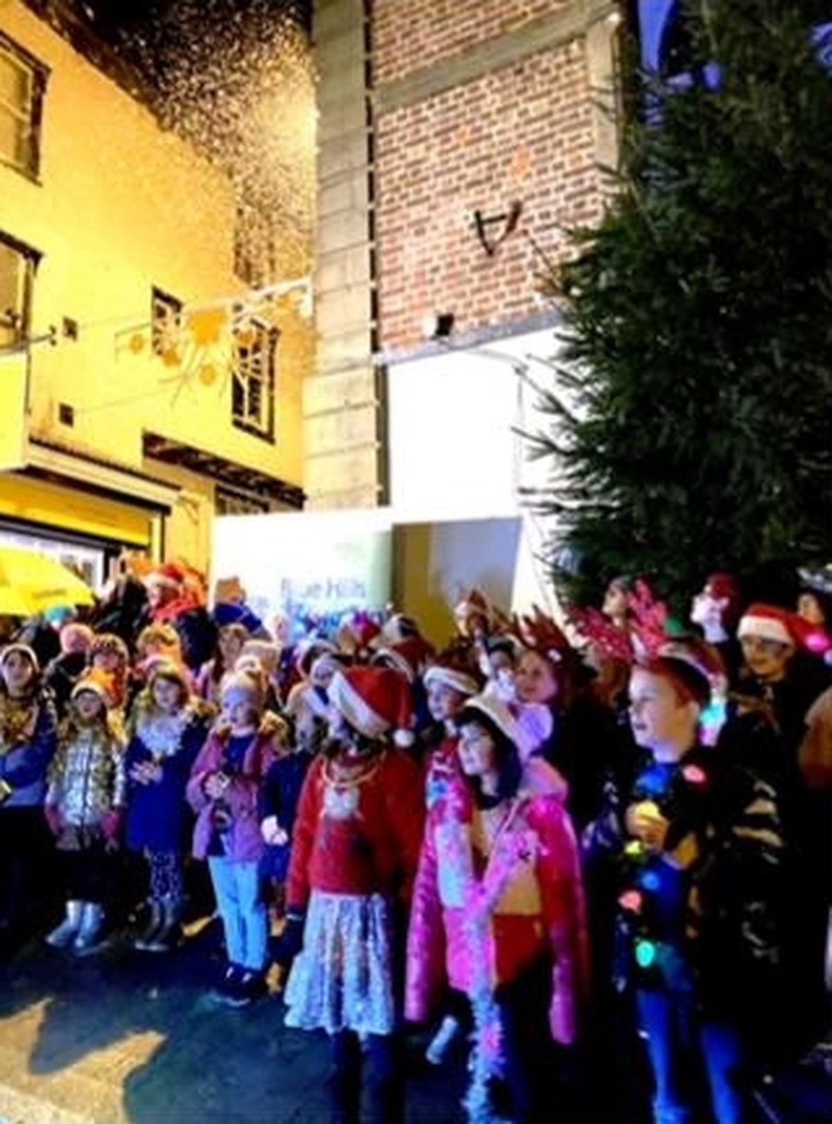 Performing at the lights switch-on. 