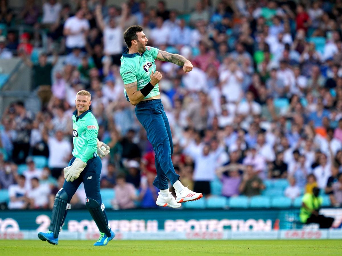 Reece Topley celebrates after taking a wicket