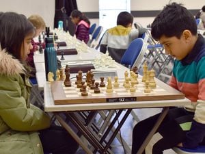 Samay Kaul of Mayfield Prep School, Walsall, playing with the white pieces, takes on Anvikkashri Prabhakaran of Leamington Spa in the under-eights section. They fought all the way until only the kings were left – a draw.