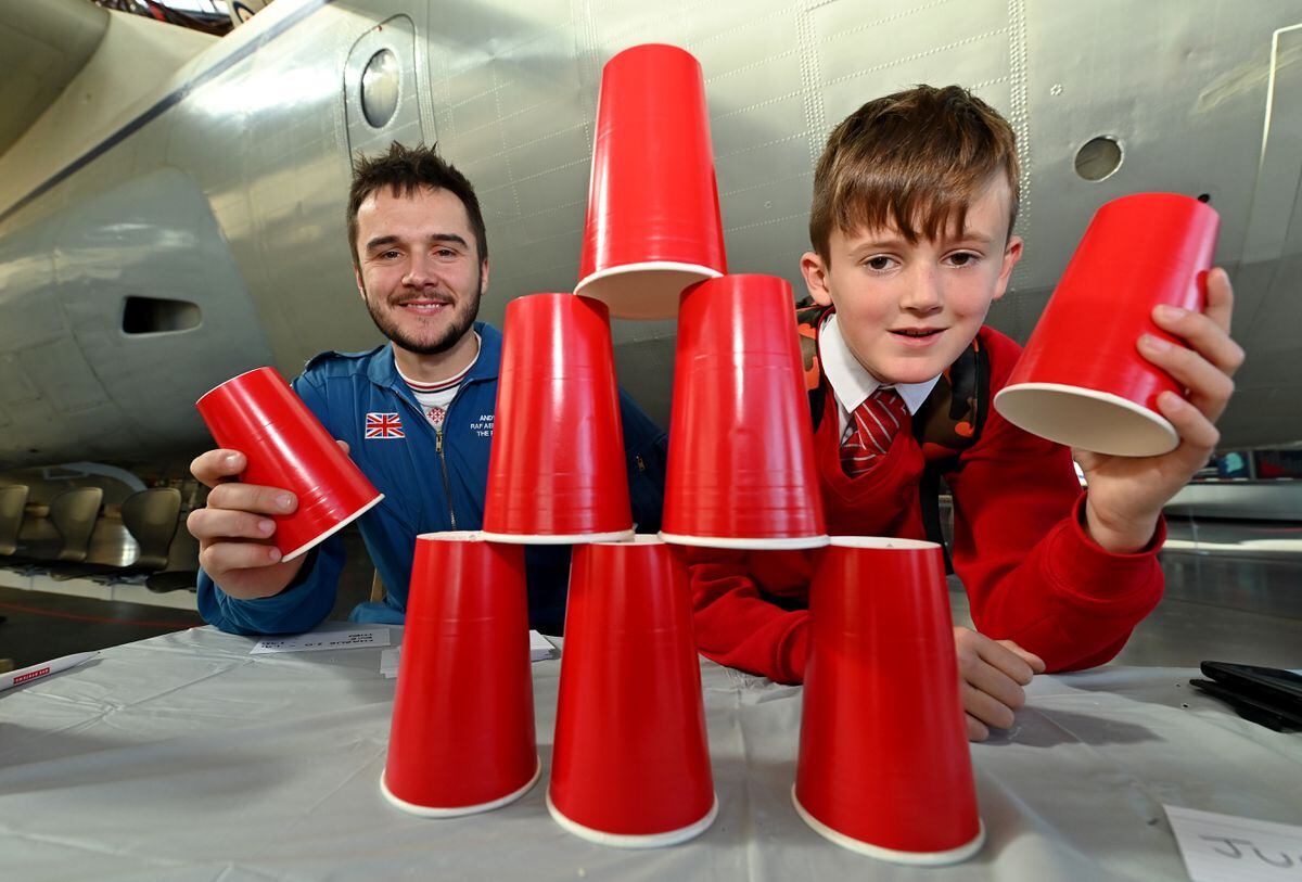 Theo Griffiths, aged 10, with Andy Collins from the Red Arrows team