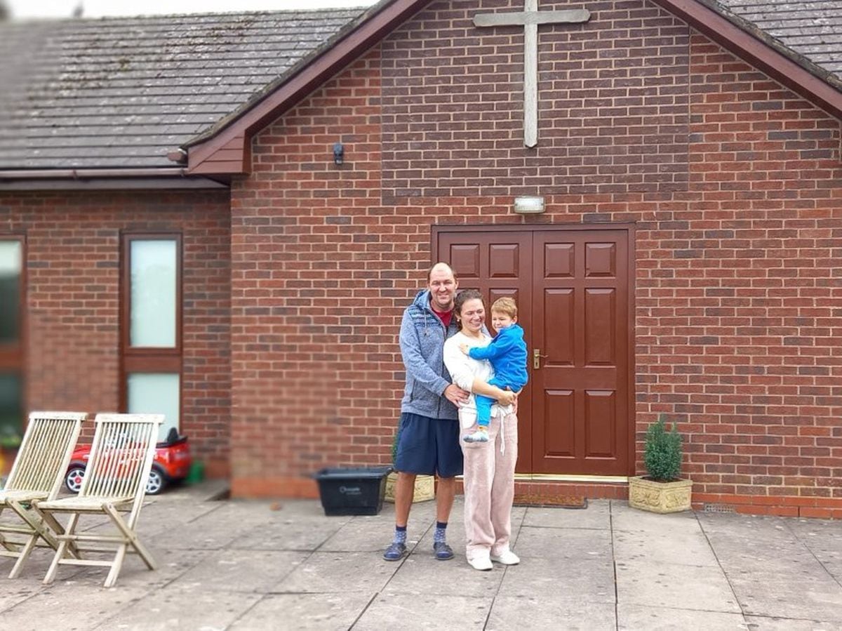 The family outside their chapel home