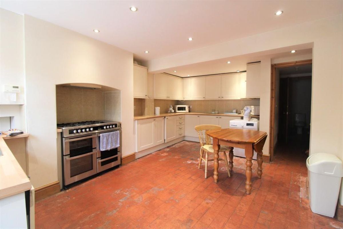 The kitchen's old stone floor works well with the modern spotlights. Photo: Rightmove