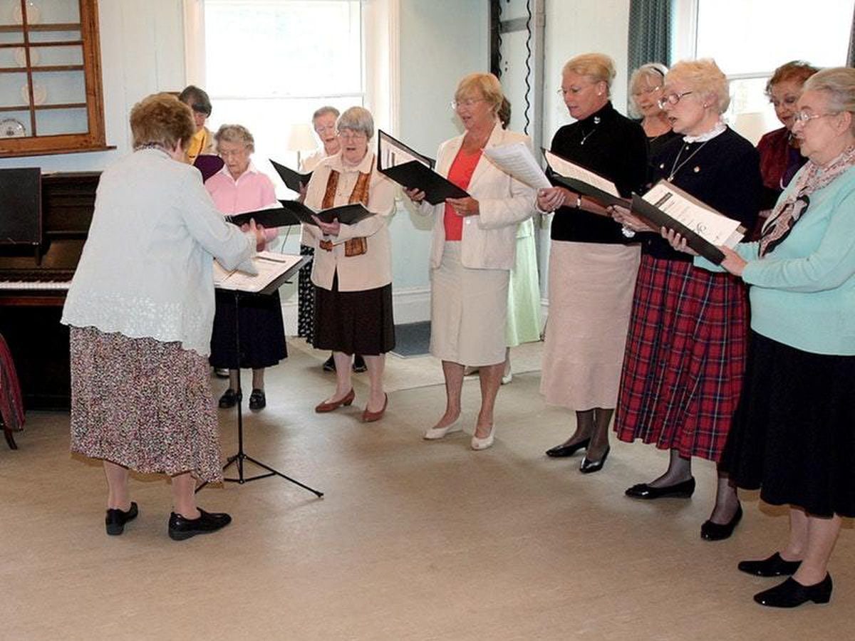 The Womenâs Institute choir perform in a village hall in Kingsands, Cornwall