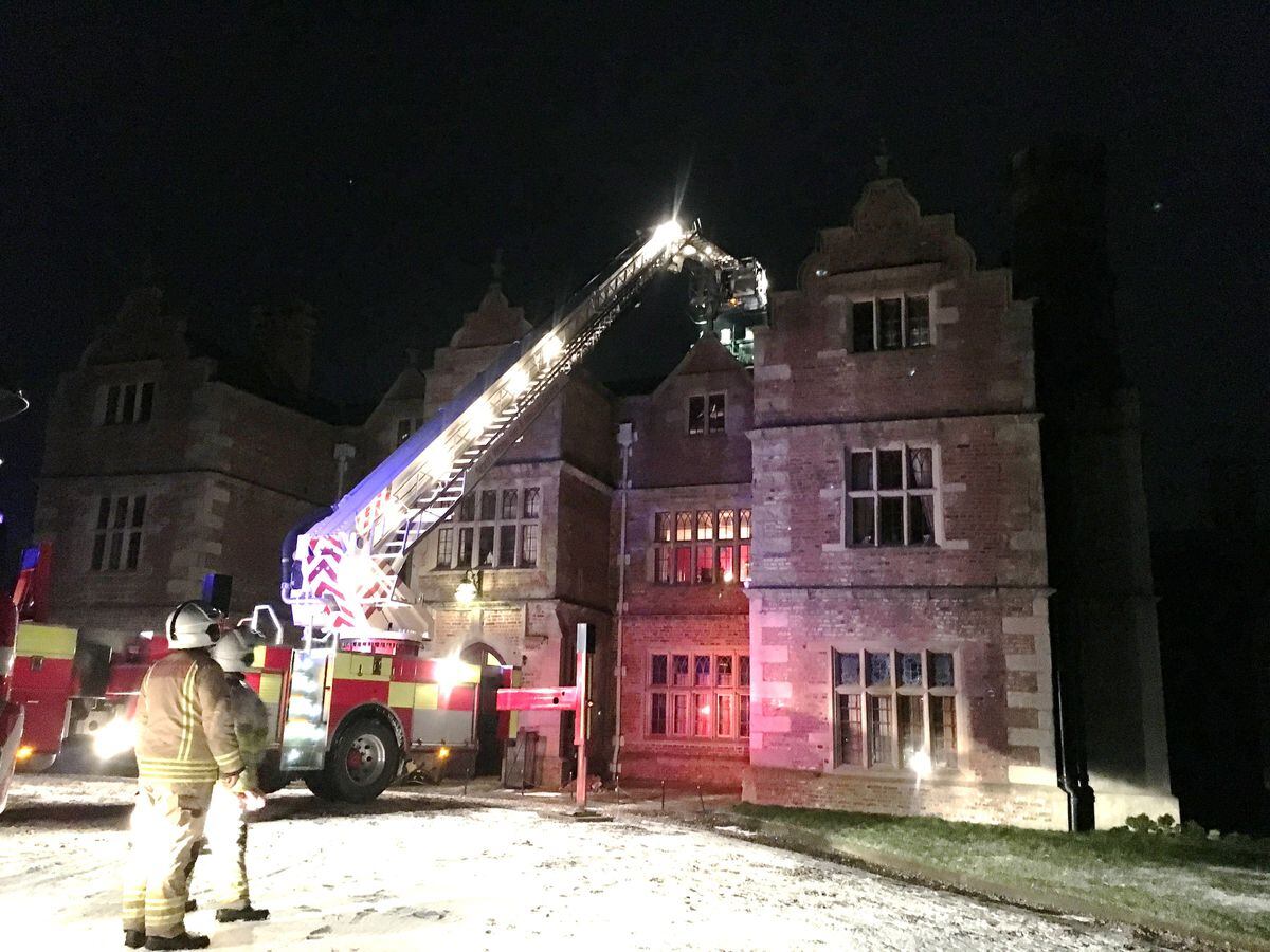 Firefighters outside Brynkinalt Hall