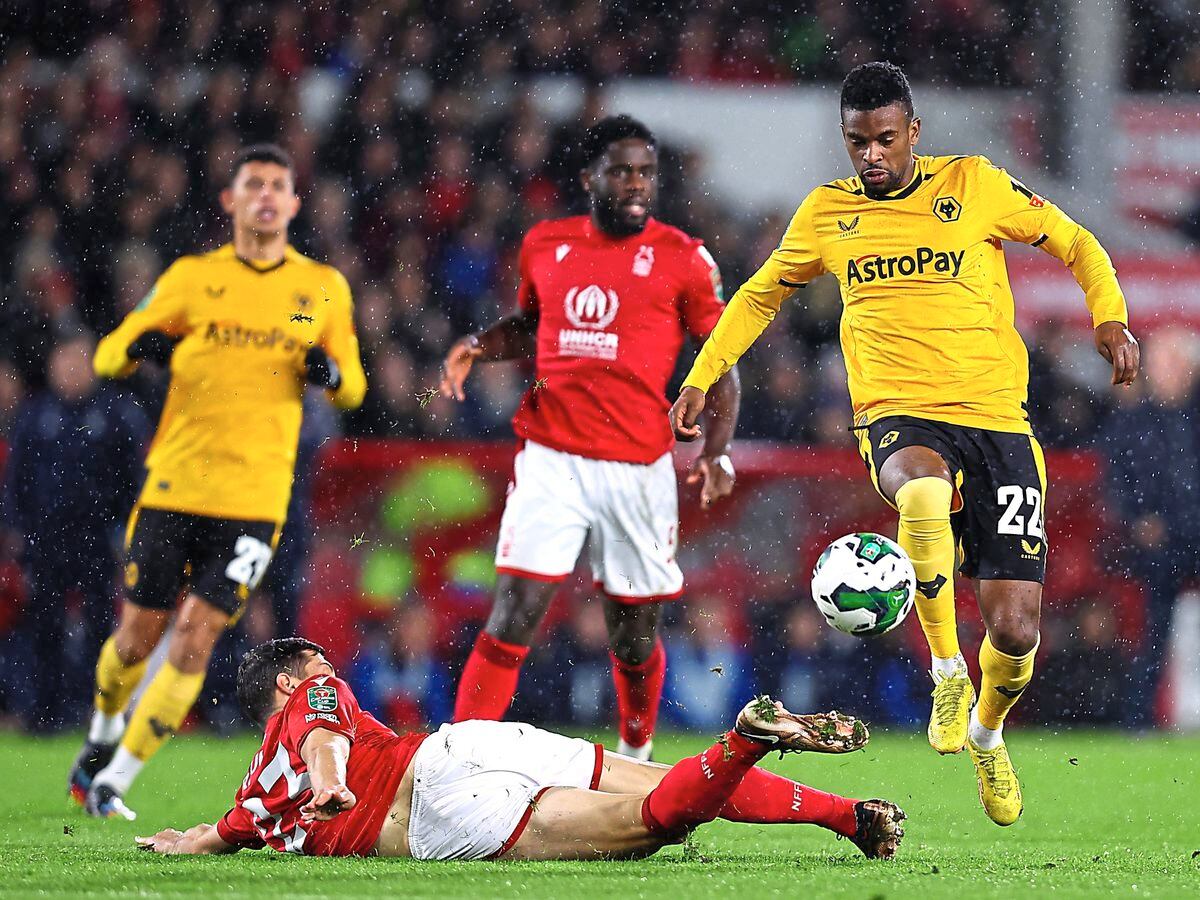 Nelson Semedo of Wolverhampton Wanderers is challenged by Remo Freuler of Nottingham Forest (Photo by Jack Thomas - WWFC/Wolves via Getty Images)