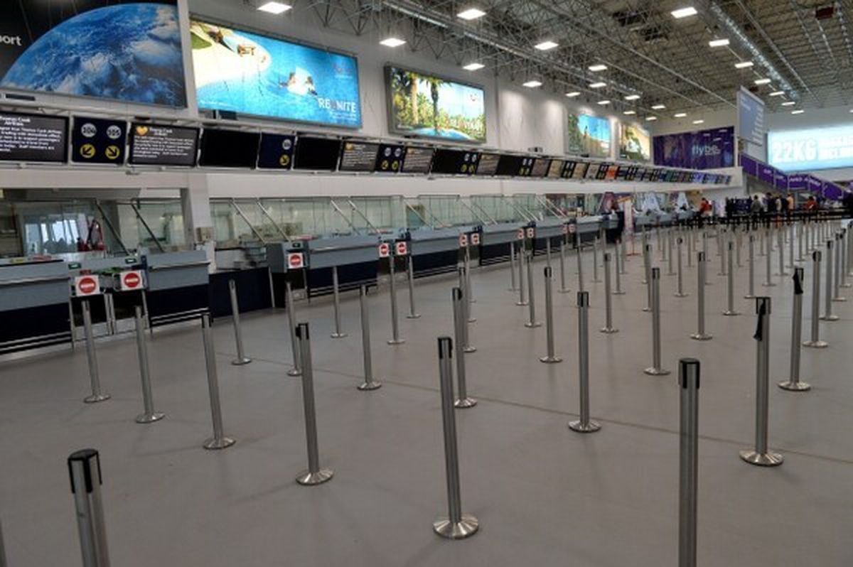 Empty Thomas Cook desks at Birmingham Airport