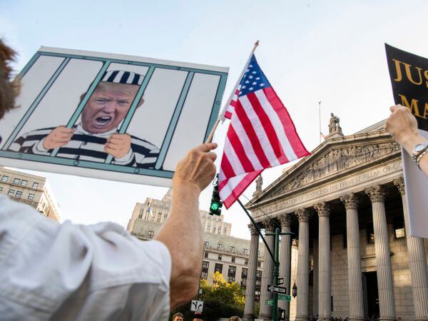 Protesters outside New York Supreme Court ahead of former President Donald Trump’s trial