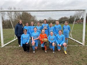 The U12 Meerkat’s girls’ football team, with coach, Merridy James