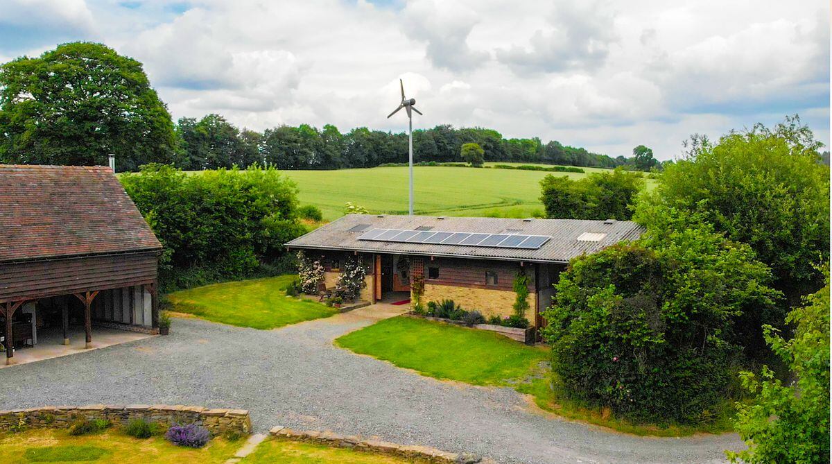 The roastery has solar panels and a windmill