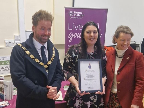 Siobhan receives her award from the High Sheriff of Shropshire, Selina Graham, and the Mayor of Dawley, Councllor Ian Preece.