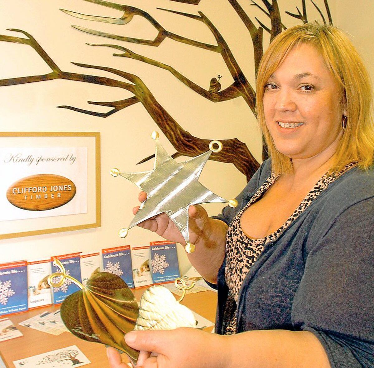 Simi Epstein, director of fundraising at Hope House Children's Hospice in Morda near Oswestry, with the tree of hope at the new counselling centre at Hope House.WITH WORDS SUE FOR STAR AND OSWESTRY BORDER CHRON..PIC BY SIMON WILLIAMS