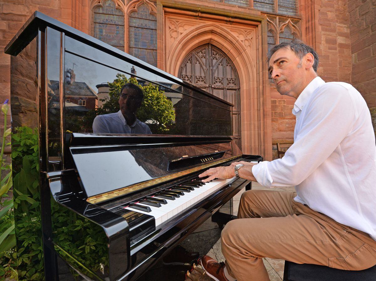 Alistair McGowan playing piano at Fringe community piano, Ludlow, in advance of piano festival in the town..